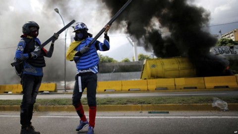 Slain Venezuelan protester's father appeals to President Maduro as a 'friend'