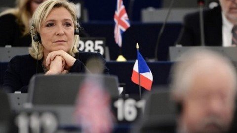 France's Marine Le Pen charged over funding scandal