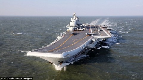 China has 'almost doubled the fighting power of its aircraft carrier' as Beijing conducts drill on the warship near Taiwan Strait