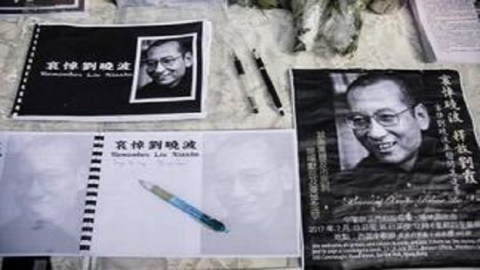 Nobel laureate Liu cremated; China says wife 'free so far'
