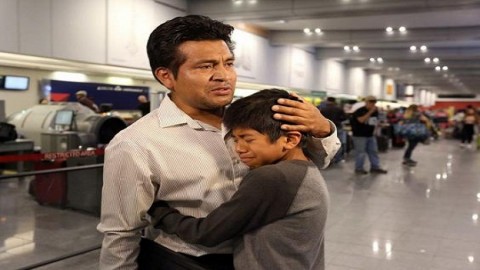 Donald Trump's immigration crackdown encapsulated in poignant images of father being deported