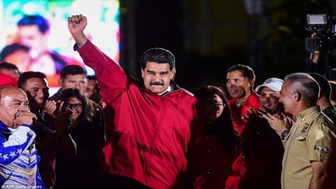 "Victory for the revolution': Venezuelan President Maduro claims election win as opponents vow to keep protesting after 10 are killed in wave of bloodshed