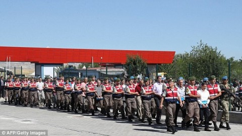Dozens of Turkish prisoners are paraded in public for show trial as 500 'traitors' including generals and military pilots face life in prison over failed coup
