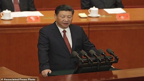 'Communist Party commands the gun': Xi Jinping says China will never 'swallow bitter fruit' and permit loss of 'any piece' of land in warning to India, Japan and Taiwan