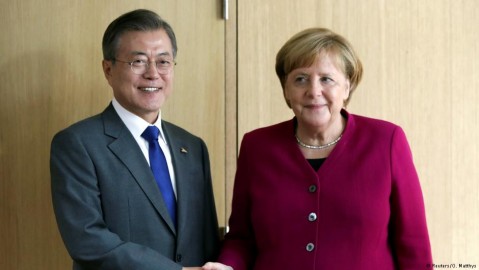 Germany’s Angela Merkel and South Korean President Moon Jae-in meet in Brussels. Photo: O. Matthys / Reuters