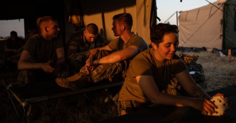 Soldiers relaxed in their tent at Base Camp Donna in Texas. Thousands of troops have been deployed to the border with Mexico. Photo: Tamir Kalifa for The New York Times