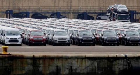 Parked cars are pictures at the car terminal at the port of Valencia, Spain May 29, 2018. Photo:. Heino Kalis / Reuters