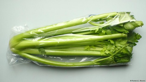 Celery wrapped in plastic packaging. Photo: L. Niesner / Reuters