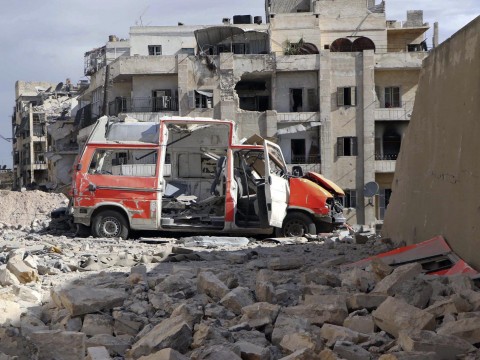 A destroyed medical van outside the Civil Defense main center in Aleppo, Syria, 2016. Photo: AP