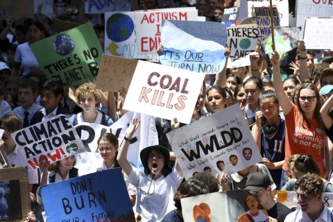 Thousands of students gather in Sydney during a rally demanding the government act on climate change. The coordinated rallies were held in close to 30 cities and towns on Nov. 30, 2018.  Photo: Dan Himbrechts / AAP Image / AP