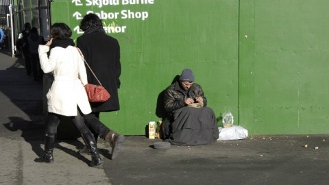 Foreigner homeless begging on the streets in Denmark, February 2015.