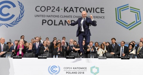 COP24 President Michal Kurtyka celebrates at the end of the final session of the summit on climate change in Katowice. Photo: Janek Skarzynski/AFP via Getty Images