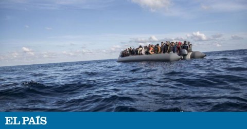 A small boat packed with immigrants being rescued by Spanish NGO Proactiva Open Arms on December 21st