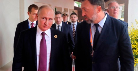 Oleg V. Deripaska, right, an influential Russian oligarch with close ties to President Vladimir V. Putin, was hit with sanctions last spring. Photo: Pool photo, via AP