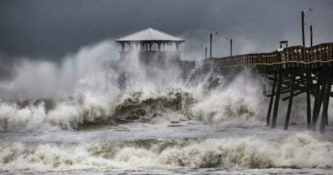 Waves slam the Oceana Pier & Pier House Restaurant in Atlantic Beach, North Carolina, as Hurricane Florence approaches the area. Photo: Travis Long/The News & Observer/AP