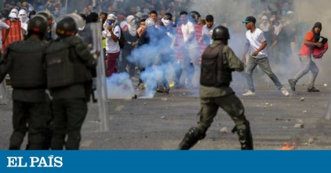 The Venezuelan regime police known as Guardia Nacional Bolivariana shooting tear gas bombs to the people during protests against the regime.