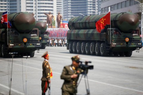 ICBMs are driven past the stand with North Korean leader Kim Jong Un and other high-ranking officials during a military parade marking the 105th birth anniversary of the country's founding father Kim Il Sung, in Pyongyang April 15, 2017. Photo: Damir Sagolj/Reuters File Photo