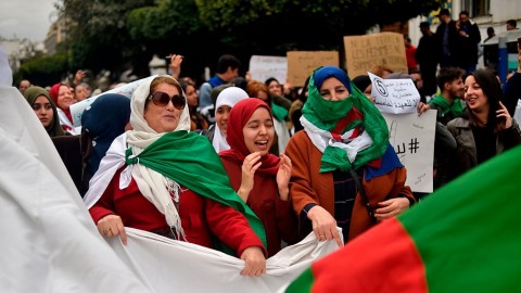 Algeria protesters chant: "Peaceful! Peaceful!"