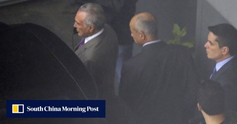 Former Brazil president Michel Temer (left) at the airport in Sao Paulo, Brazil on March 21, 2019.