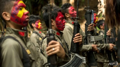 Guerrillas of the New People's Army (NPA) pictured in 2017 in the Sierra Madre mountain range east of Manila