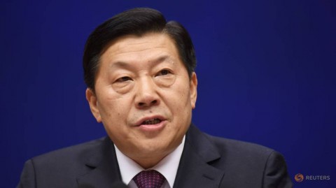Lu Wei, head of Cyberspace Administration of China, attends a news conference in Beijing, China December 9, 2015