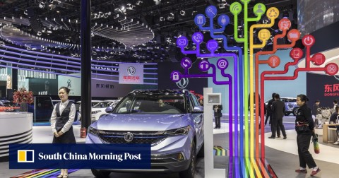 A Dongfeng Motor Group AX7 plug-in hybrid electric vehicle on display at the Auto Shanghai 2019 on April 17. 
