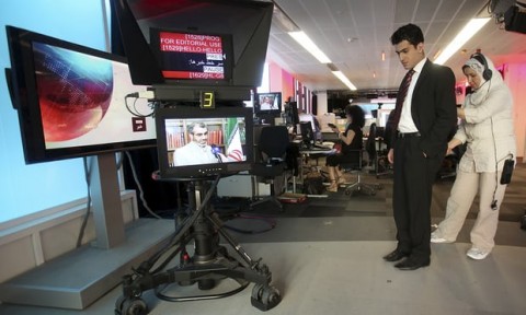 Fardad Farahzad, a presenter for BBC Persian, prepares to read the news. Simon Dawson/AP