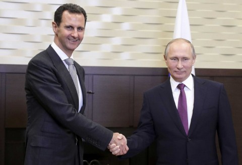 On surprise Russia trip, Assad and Putin talk post-war Syria