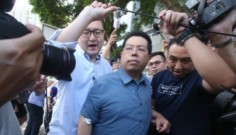 Revised charge against Hong Kong activist in kidnap saga