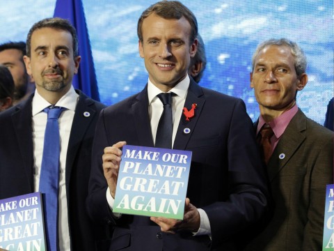 Macron says the world is losing against climate change at summit Trump wasn't invited to