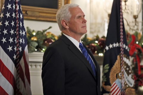In this Dec. 6, 2017, photo, Vice President Mike Pence listens as President Donald Trump speaks in the Diplomatic Reception Room of the White House in Washington. (AP Photo/Alex Brandon)