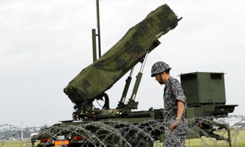 Japan approves record defence budget to tackle North Korea