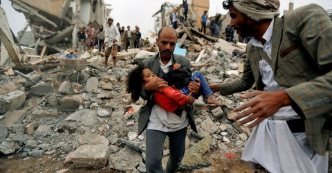 A man carries Buthaina Muhammad Mansour, an injured girl rescued from the site of a Saudi-led air strike, in Sanaa, Yemen, on August 25, 2017.  Khaled Abdullah / Reuters