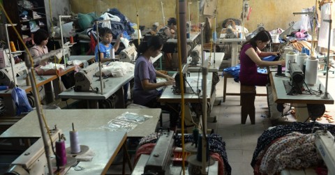 Laborers in a garment workshop on the outskirts of Hanoi in Vietnam | Hoang Dinh Nam/AFP via Getty Images