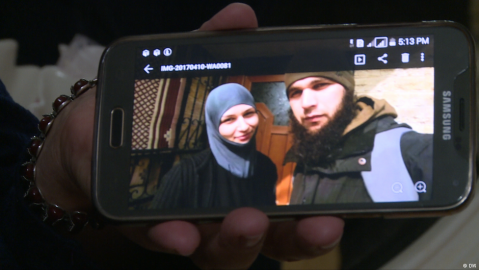 Missing Chechen youths shown on a mobile phone display. Photo: DW archive