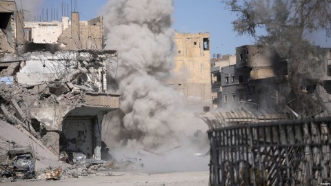 Smoke rises after a landmine is exploded as fighters of Syrian Democratic Forces clear roads after the liberation of Raqqa, Syria, Oct. 18, 2017. Photo: Reuters