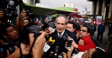 Former President Álvaro Colom of Guatemala, center, was arrested Tuesday in Guatemala City in connection with a corruption investigation. Photo: Edwin Bercian/EPA