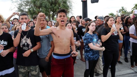 West Boca Raton Community High School students cheer after reaching Marjory Stoneman Douglas High School in Parkland, Fla. (Amy Beth Bennett / South Florida Sun-Sentinel)