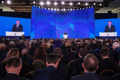 An unmanned nuclear-powered submersible appears on screen during Putin’s speech. Photo: Mikhail Metzel\TASS via Getty Images