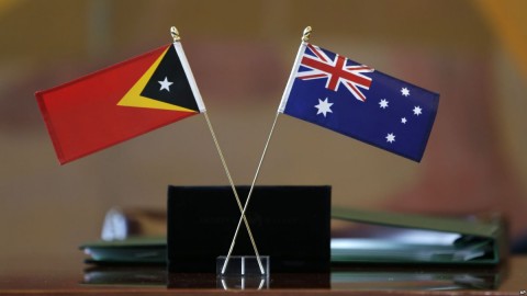 The flags of East Timor, left, and Australia are displayed during a ceremony at United Nations headquarters, March 6, 2018. Photo: AP