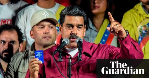 Nicolás Maduro, seen here holding the political constitution, said: ‘The revolution is here to stay.’ But Boris Johnson said the G20 would ‘be talking about what we can do’. Photo: Juan Barreto/AFP/Getty Images