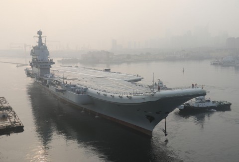 In this May 13, 2018, file photo provided by China's Xinhua News Agency, China's indigenous aircraft carrier lifts anchor in Dalian in northeast China's Liaoning Province. Photo: Li Gang/Xinhua via AP