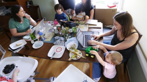On Wednesday, June 27, 2018, a small group of stay-at-home mothers, with children at their sides, work to organize an immigration rally in Portland, Ore. Photo: AP