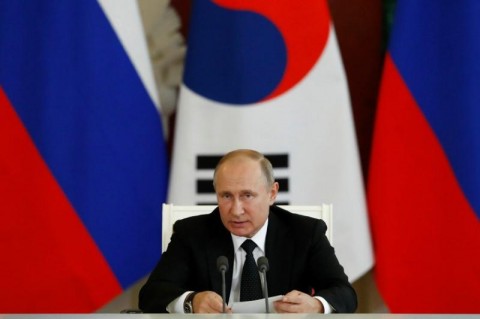 Russian President Vladimir Putin speaks during a joint news conference with South Korean President Moon Jae-in following talks at the Kremlin in Moscow, June 22, 2018. Photo: Reuters/Sergei Karpukhin