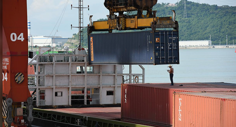Shipping containers are seen on a cargo vessel at the Dachan Bay Terminals in Shenzhen, Guangdong province, China July 12, 2018. REUTERS/Stringer