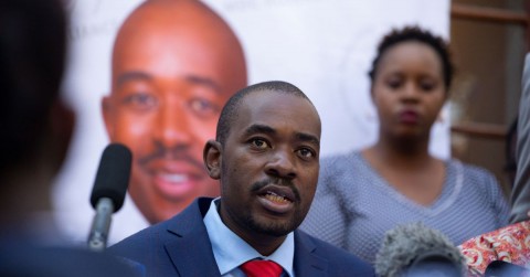 Nelson Chamisa, the leader of the Movement for Democratic Change (MDC) party, speaking with reporters on Friday. Jekesai Njikizana/AFP/Getty Images