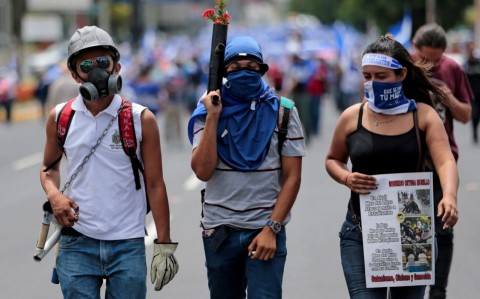 Demonstrators armed with rudimentary mortars have been picked off by state-sponsored assassins in a bloody crackdown. Photo: Oswaldo Rivas / Reuters