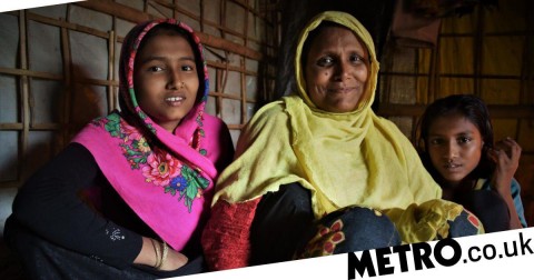 Rohingya refugee Ayesha with her daughters in her shelter in the camps in Cox’s Bazar, Bangladesh. Photo: Maruf Hasan/Oxfam