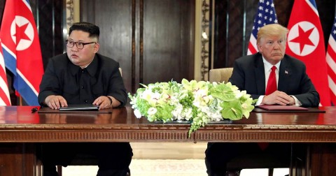 President Donald Trump and North Korean leader Kim Jong Un hold a signing ceremony at the conclusion of their summit in Singapore June 12, 2018. Photo: Jonathan Ernst / Reuters