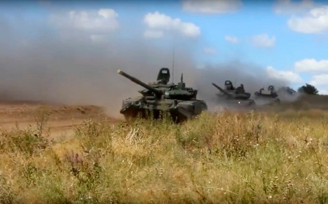 In this photo taken from video provided by Russian Defense Ministry Press Service on Sept. 11, tanks roll during military exercises in country’s east. (AP)